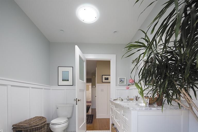 Solatube Daylighting System before and After bathroom