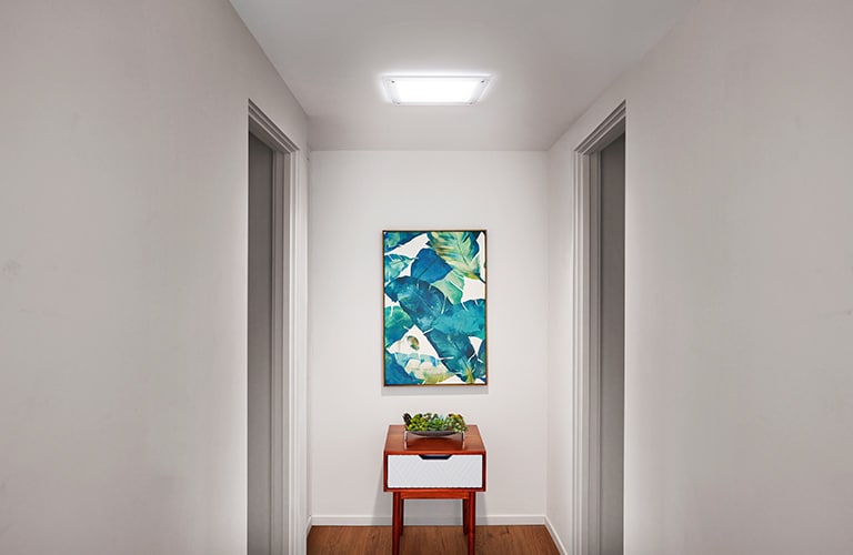 Solatube Daylighting System before and After living room