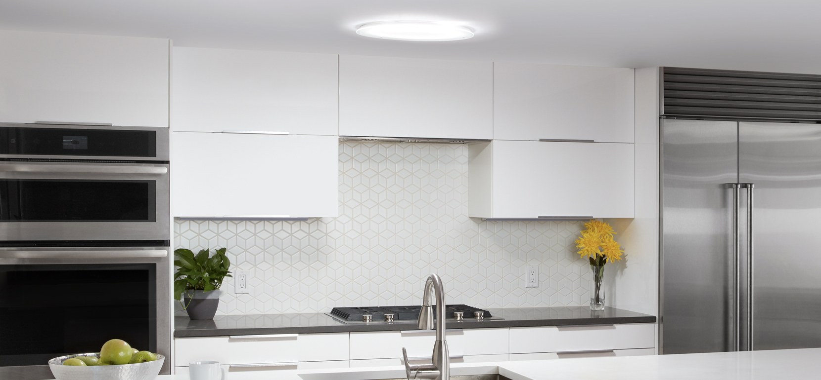 Kitchen illuminated with natural light from a Solatube tubular skylight
